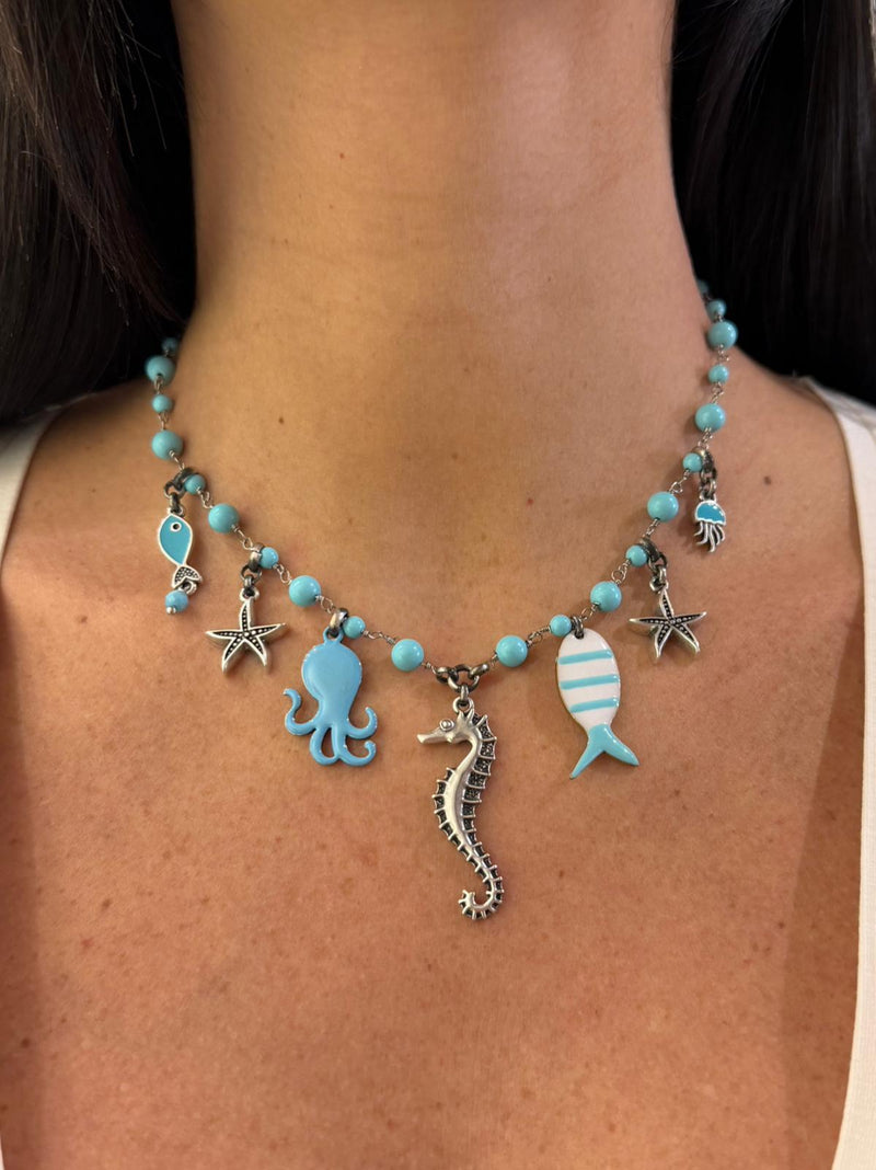Collana  argentata perle turchesi e ciondoli marini